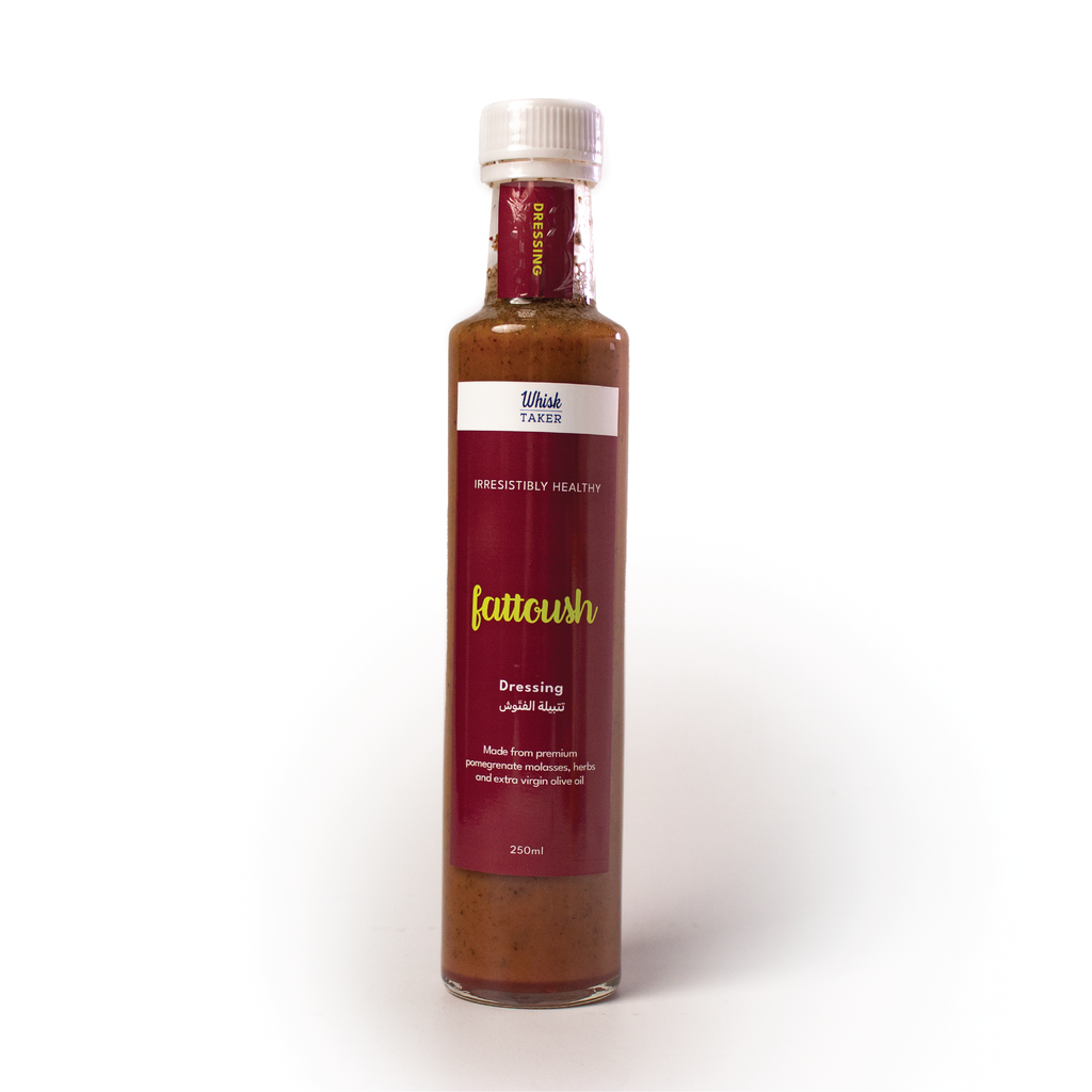 Bottle of Whisktaker fattoush dressing on a white background